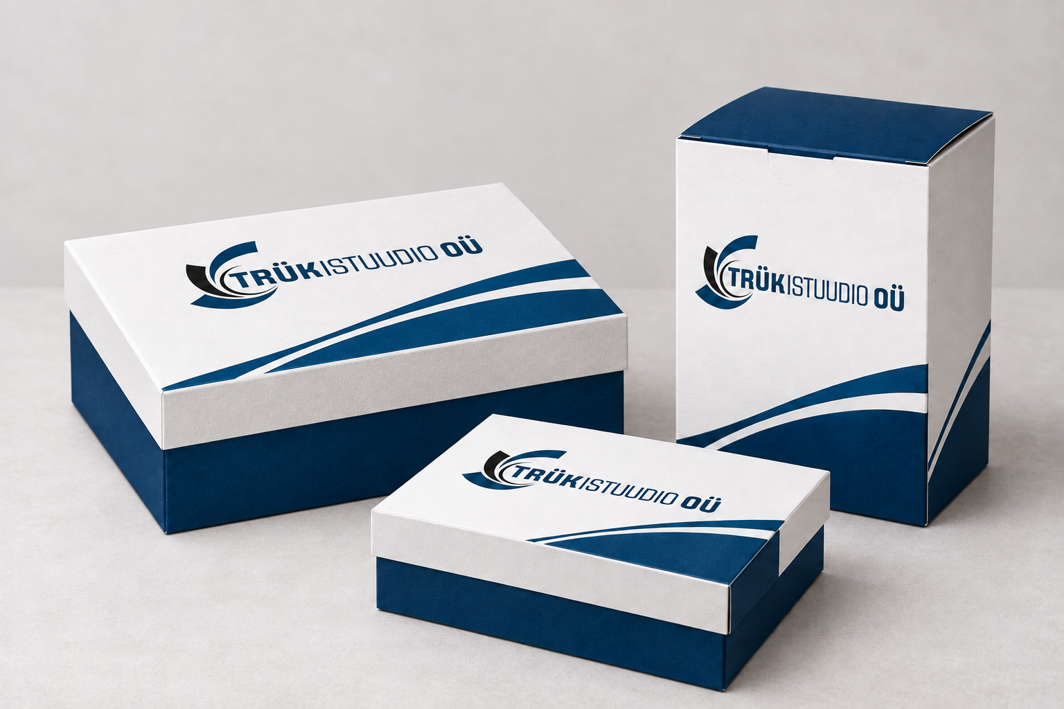 three navy white branded gift boxes